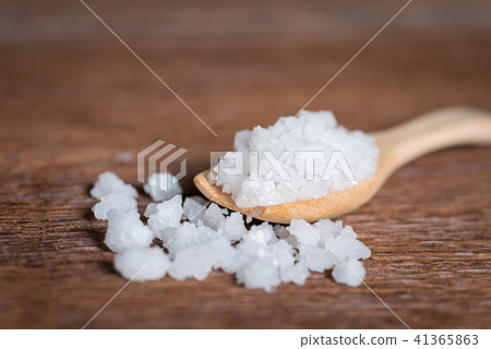 Sea salt in wood spoon. Sea salt in wood spoon. 41365863