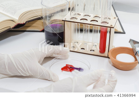 Lab tube, eppendorfs with red liquid. 41366994