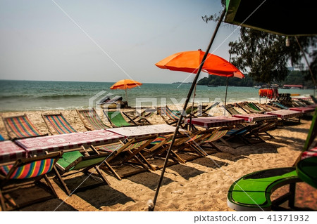 sun beds and umbrellas on ochheutal beach Cambodia sun beds and umbrellas on ochheutal beach Cambodia 41371932