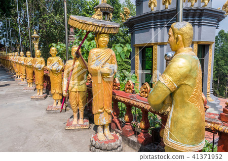 statues surrounding temple of wat kraom. Cambodia statues surrounding temple of wat kraom. Cambodia 41371952