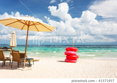 Beach Chair, Umbrella And Red Life Buoy Beach Chair, Umbrella And Red Life Buoy 41371957
