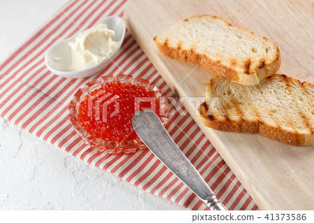 toasts with butter and Red caviar toasts with butter and Red caviar 41373586