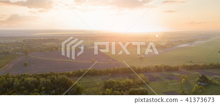 Aerial view from the drone, a bird's eye view of abstract geometric forms of abandoned runway Aerial view from the drone, a bird's eye view of abstract geometric forms of abandoned runway 41373673