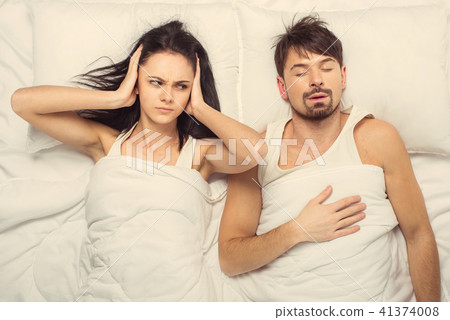 Top view.Angry woman trying fall asleep 41374008