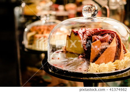 Bundt cake under glass bell dome 41374982