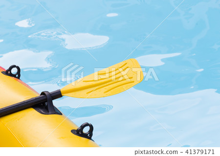 Close up yellow paddle. 41379171