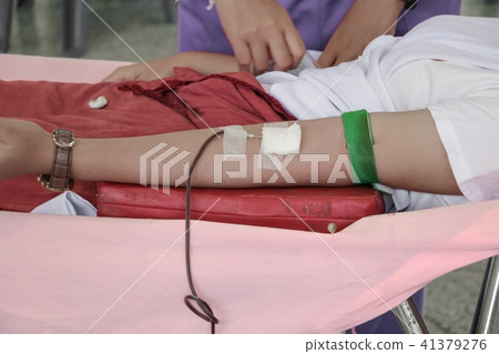 Blood donor in arm injection Blood donor in arm injection 41379276