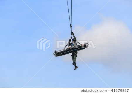 Soldier rescue emergency by army helicopter  41379837