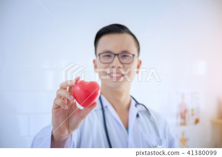 Heart in the hands of the doctor health. 41380099