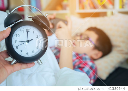 Hand show out for alarm clock on morning, Hand show out for alarm clock on morning, 41380644