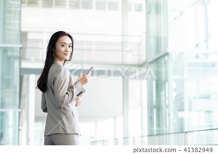 Business woman (smartphone) Business woman (smartphone) 41382949