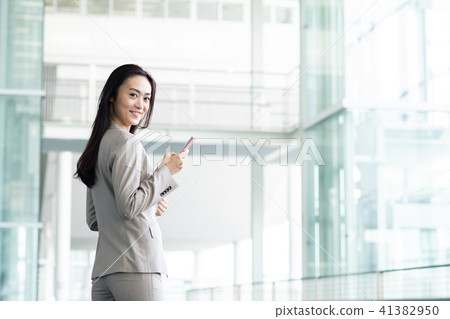Business woman (smartphone) Business woman (smartphone) 41382950