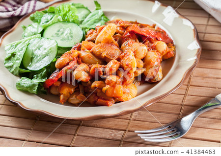 Baked giant beans with tomato sauce 41384463