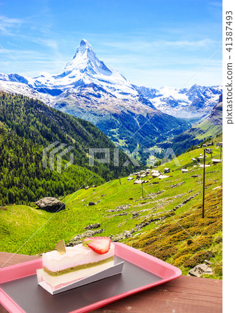 Trail view of traditional village with Matterhorn Trail view of traditional village with Matterhorn 41387493