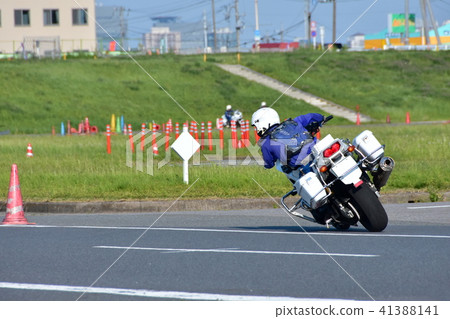 Police motorcycle officers honing their driving skills 41388141
