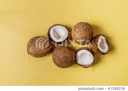 Coconuts on a pastel background. Coconuts on a pastel background. 41388258