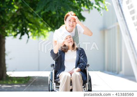 Care wheel chair woman Care wheel chair woman 41388560
