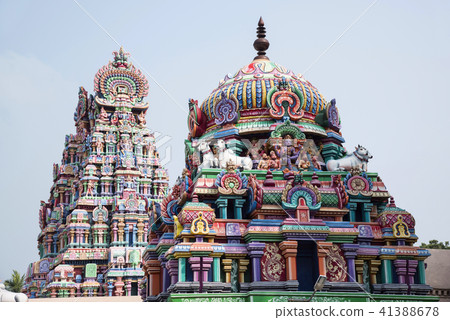 Colourful carved gopuram, near Shiva temple Colourful carved gopuram, near Shiva temple 41388678
