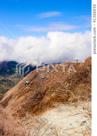 Ropeway with mountain and blue sky in Owakudani Ropeway with mountain and blue sky in Owakudani 41388939