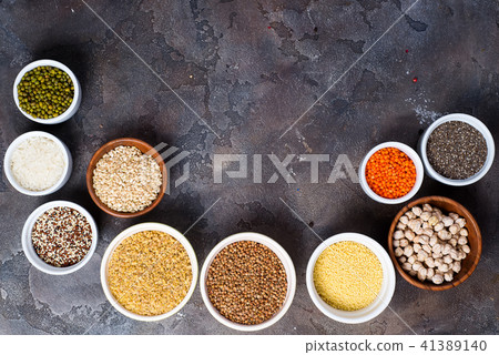 Superfoods and cereals selection in bowls on grey concrete background Superfoods and cereals selection in bowls on grey concrete background 41389140
