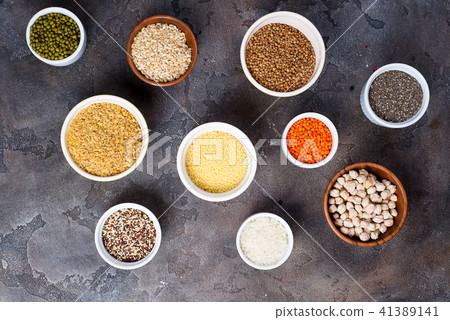 Superfoods and cereals selection in bowls on grey concrete background 41389141