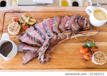 Grilled tomahawk steak Grilled tomahawk steak 41391521