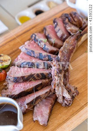 Grilled tomahawk steak Grilled tomahawk steak 41391522