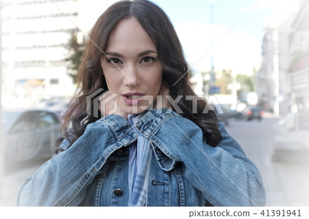 Beautiful young woman is walking 41391941