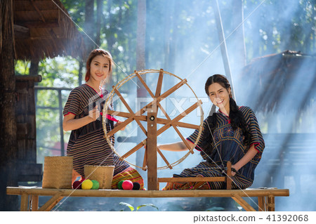 Two Beautiful Thai women smile in karen suit Two Beautiful Thai women smile in karen suit 41392068