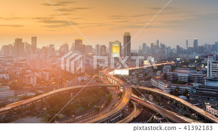 Highway intersection with city business downtown  41392183