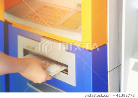 Close-up Woman hand withdrawing Thai money 41392778