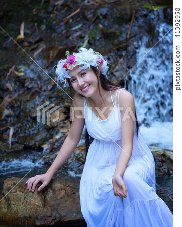 Beautiful Asian woman with white traditional Beautiful Asian woman with white traditional 41392958