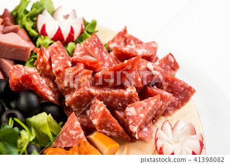 plate Board with meat and cheese. The Banquet in the Italian style. 41398082
