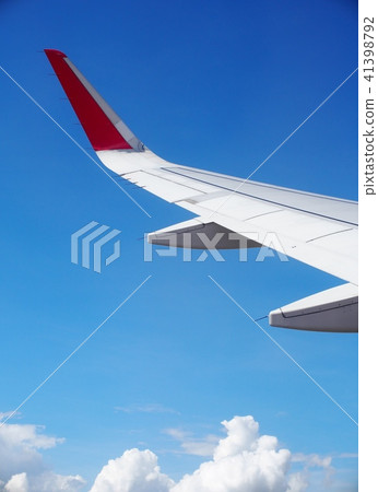 crop view of a white silver metallic airplane wing crop view of a white silver metallic airplane wing 41398792
