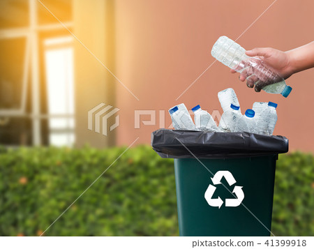 man hand putting plastic reuse for recycling man hand putting plastic reuse for recycling 41399918