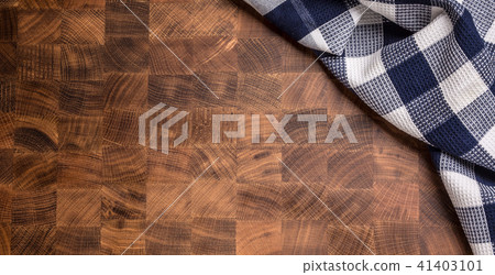 Top of view checkered tablecloth on wooden board. 41403101