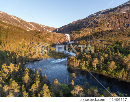 Photo of Rapid Stunning Waterfall in Husedalen Valley, Norway. Aerial view. Summer time. Photo of Rapid Stunning Waterfall in Husedalen Valley, Norway. Aerial view. Summer time. 41406537