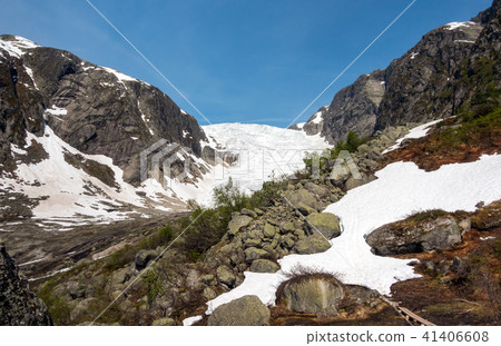 Photo of Tuftebreen - glacier in Norway is nearby to Steinmannen and Bakli. Aerial view. Photo of Tuftebreen - glacier in Norway is nearby to Steinmannen and Bakli. Aerial view. 41406608