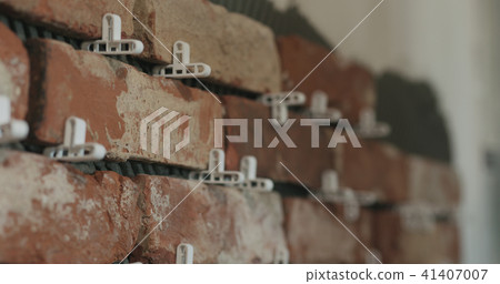 brick cuts tile on the wall closeup brick cuts tile on the wall closeup 41407007