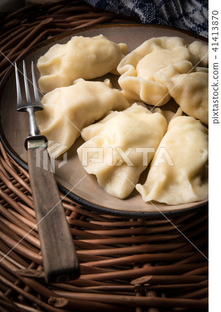 Homemade dumplings with cheese. Homemade dumplings with cheese. 41413870