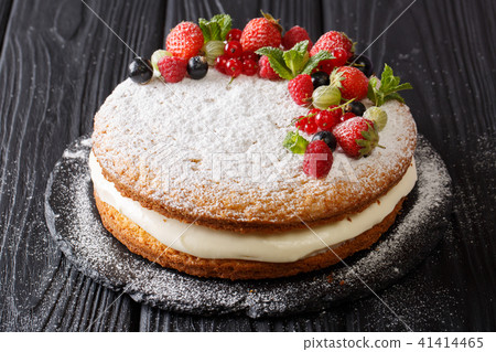 Freshly baked holiday Victoria sandwich cake 41414465