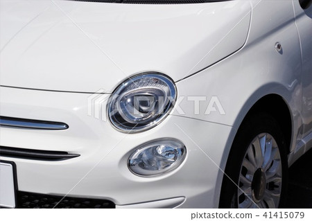 White car imported car front White car imported car front 41415079