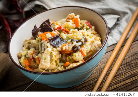 Risotto with chicken and vegetables. 41415267