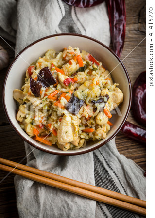 Risotto with chicken and vegetables. Risotto with chicken and vegetables. 41415270