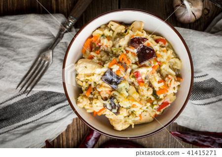 Risotto with chicken and vegetables. Risotto with chicken and vegetables. 41415271