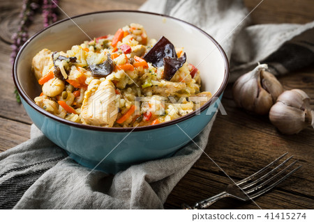 Risotto with chicken and vegetables. 41415274