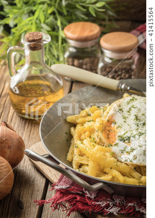 Fried egg served with yellow beans. Fried egg served with yellow beans. 41415564