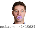 male dad with baby nipple in mouth close-up head 41415625