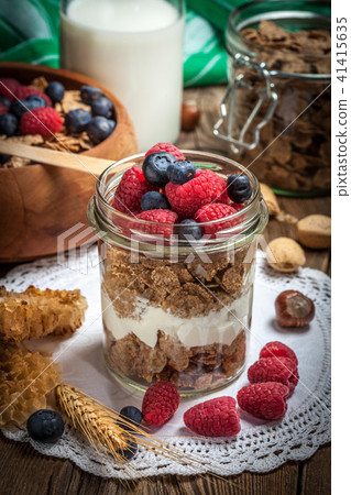 Tasty breakfast with milk and fruit. Tasty breakfast with milk and fruit. 41415635
