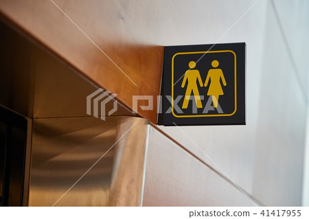 Toilet sign in a building 41417955